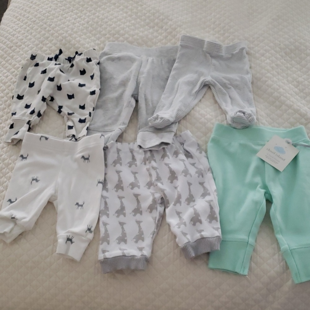 7 Newborn pants. 1 top